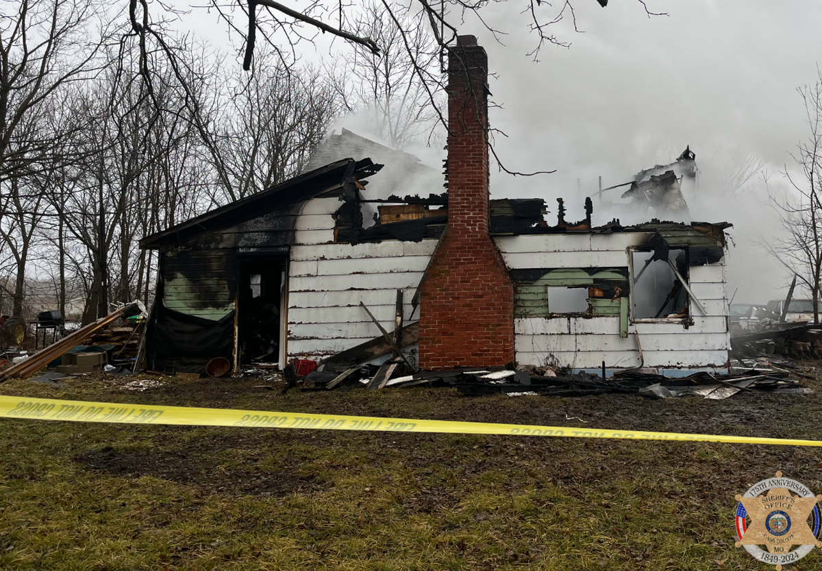 Fire crews from six area departments worked to contain a house fire in Harrisonville, Missouri, early Friday morning. One woman died following the incident.