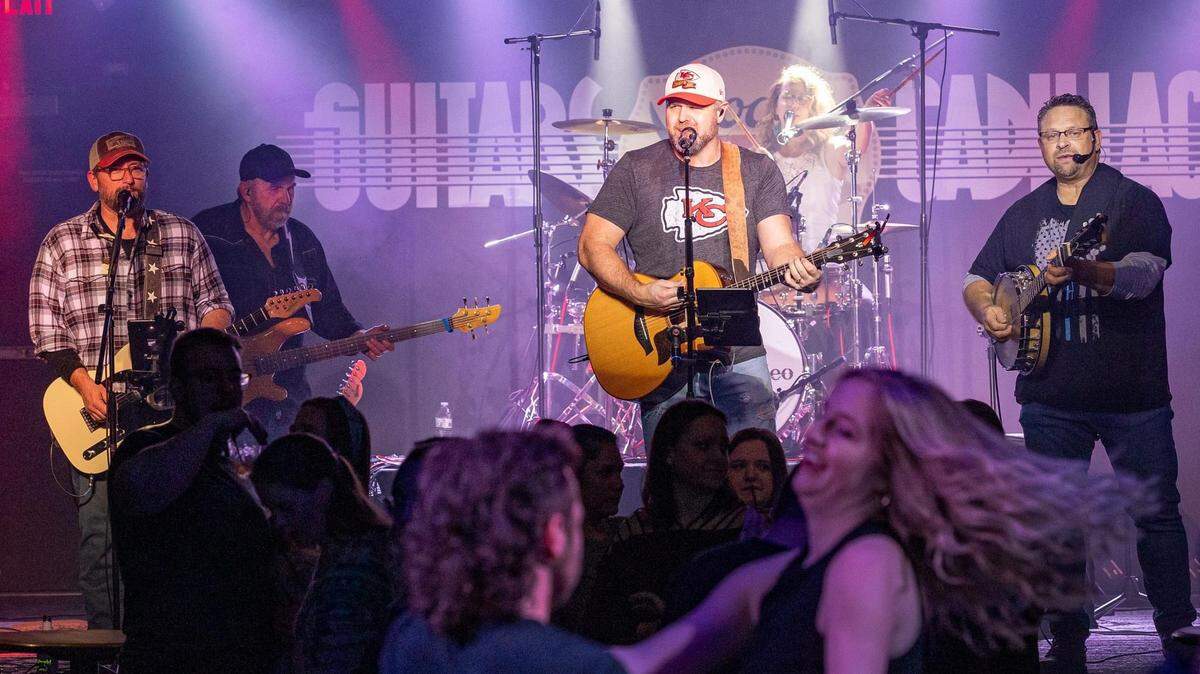 Fans are calling Kansas City country cover band Midnight Rodeo after Travis Kelce showed up at Yankee Stadium Monday night wearing a “Midnight Rodeo” hat.