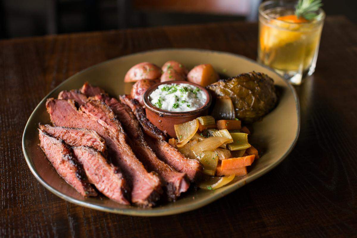 Q39’s smoked corned beef brisket plate with cabbage, new potatoes and root vegetables.