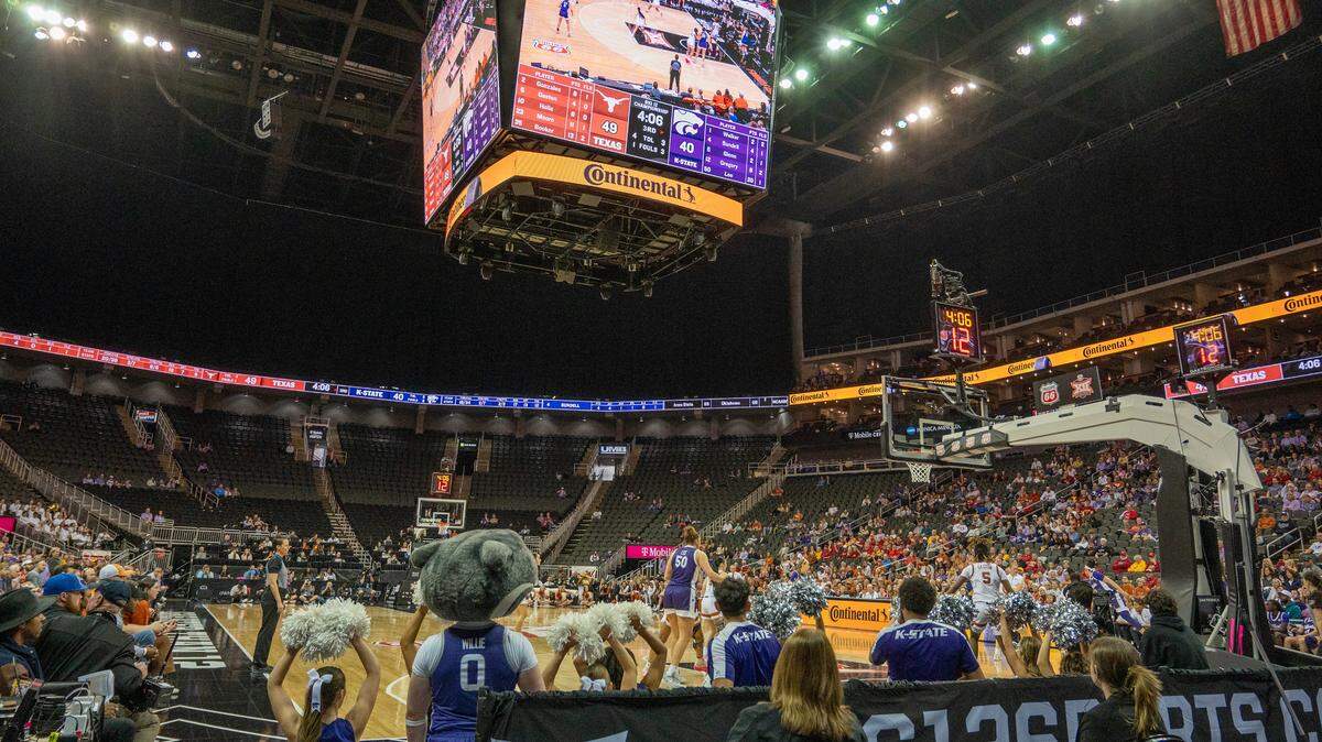 Fans watch the semifinal women’s basketball game between the Kansas State Wildcats and Texas Longhorns in the Big 12 Tournament at T-Mobile Center on Monday, March 11, 2024, in Kansas City.
