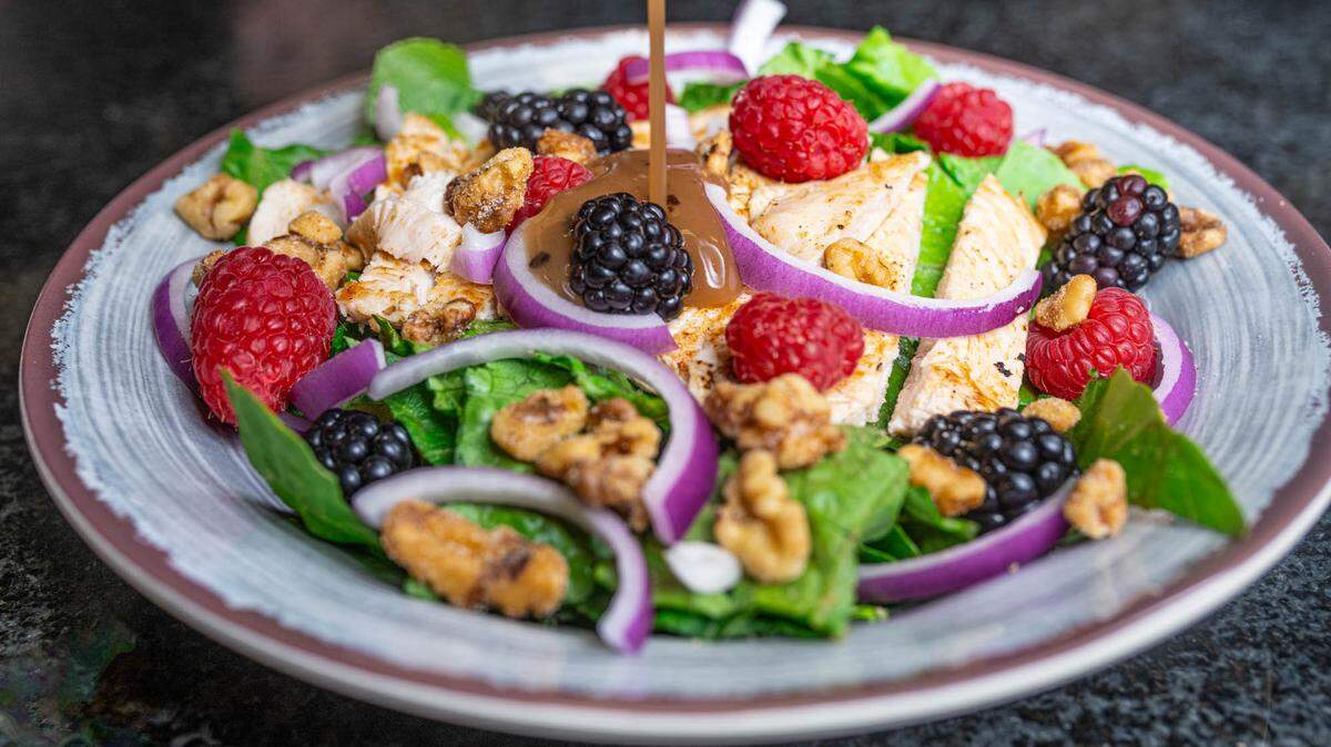 Good People Cafe served a berry chicken walnut salad. The Grain Valley restaurant closed earlier this month.