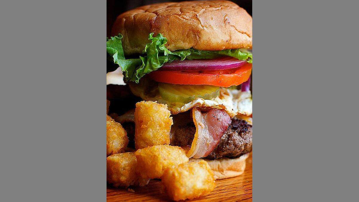Fred P. Ott's is known for the "biggie" burgers and easygoing atmosphere.