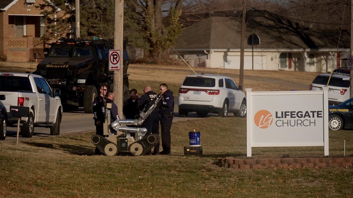 Officials used a robot and a drone to search the home in 2300 block of Blue Ridge Boulevard for other people during a standoff that began Tuesday night in which three Kansas City police officers were shot and injured.