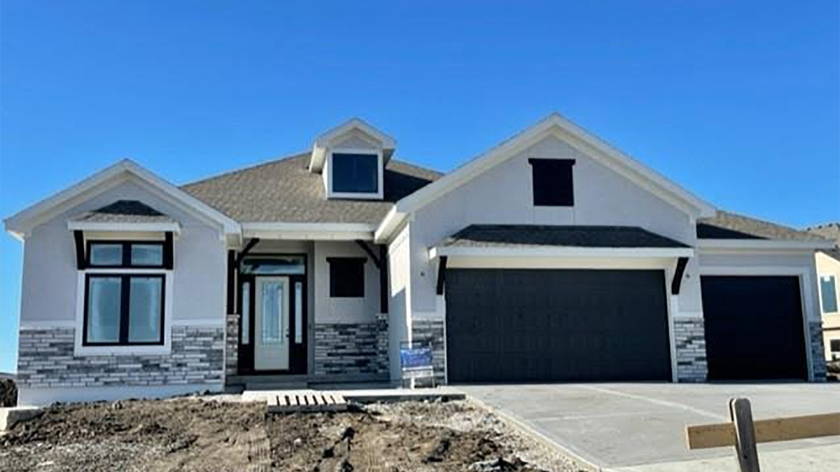 Nearing completion is this 3,100+-square-foot John Stewart Custom Homes’ reverse 1½-story at 17328 Gillette, priced at $664,900. Features include two fireplaces, a covered deck and patio, a walkout-walkup lower level.