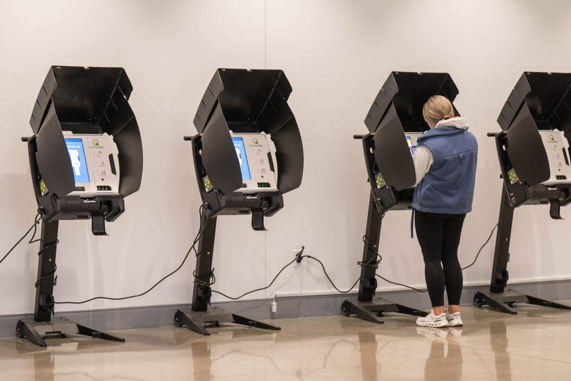 A voter casts an electronic ballot on Election Day, Tuesday, Nov. 4, 2025, at Johnson County Arts and Heritage Center in Overland Park.