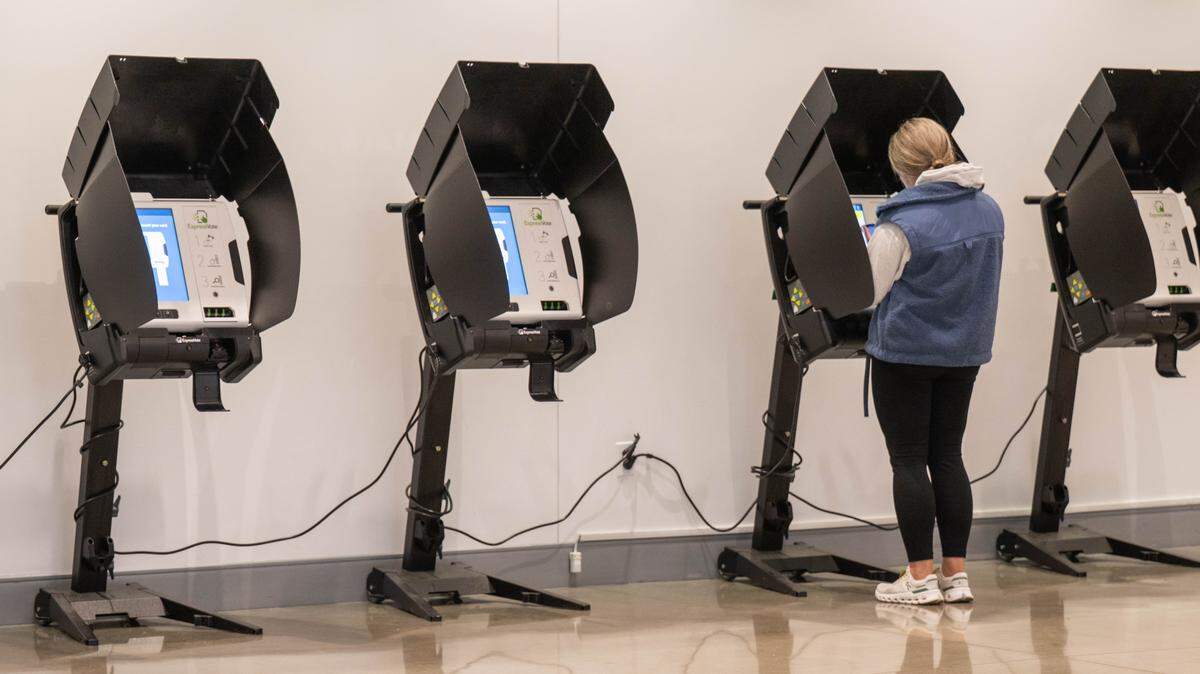 A voter casts an electronic ballot on Election Day, Tuesday, Nov. 4, 2025, at Johnson County Arts and Heritage Center in Overland Park.