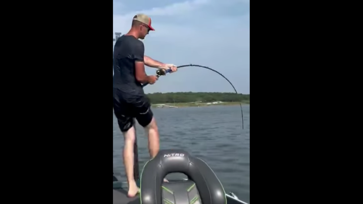 Ryan Davison, of the Oklahoma Paddlefish Guide Service, caught a rare black paddlefish while on a solo fishing trip.