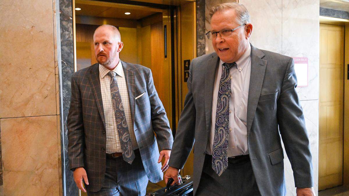 Britt Reid, left, walks to a courtroom with his attorney J.R. Hobbs, right, Tuesday, Nov. 1, 2022, at the Jackson County Courthouse to be sentenced for a drunk driving conviction. 