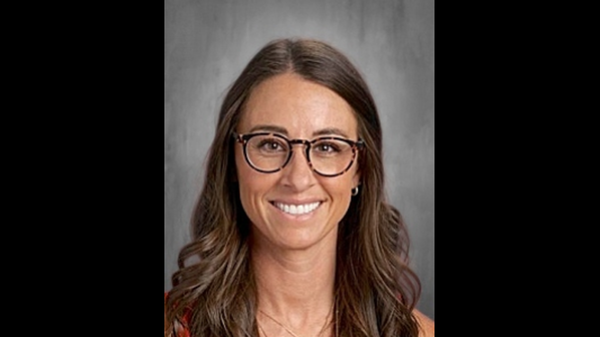 A school portrait of Jamie Trumpp from the Indian Trail Middle School website. Trumpp, who teaches music at the school, survived a stabbing at an Olathe park last week. A man has been charged with attempted murder after the incident.
