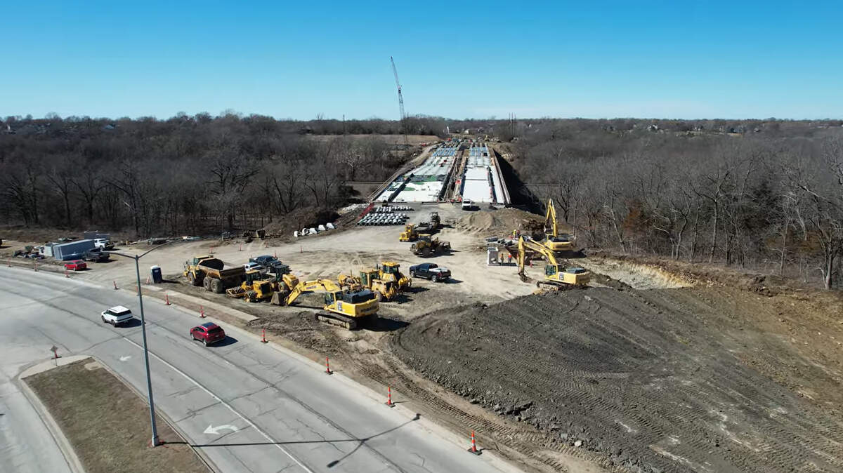A screenshot of drone footage from February of a bridge being constructed as part of the 119th Street Extension Project.