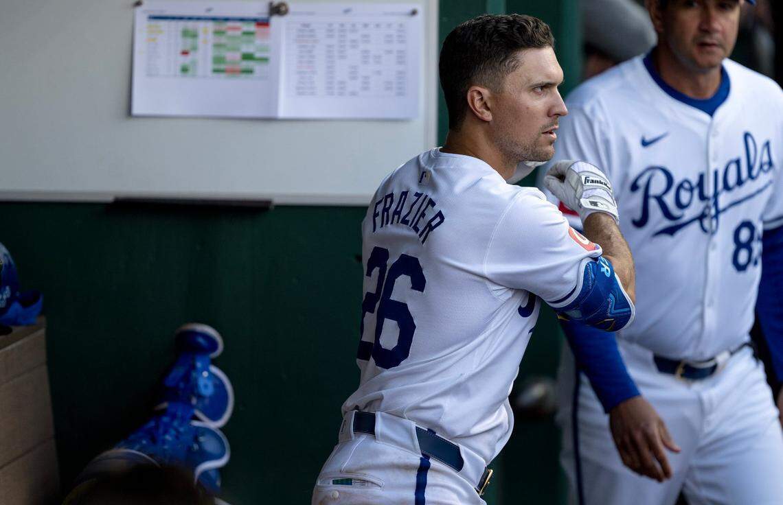 Kansas City Royals second baseman Adam Frazier watches the pitcher for the Minnesota Twins while he prepares for an at-bat in the dugout during the Royals’ home opener Thursday at Kauffman Stadium.