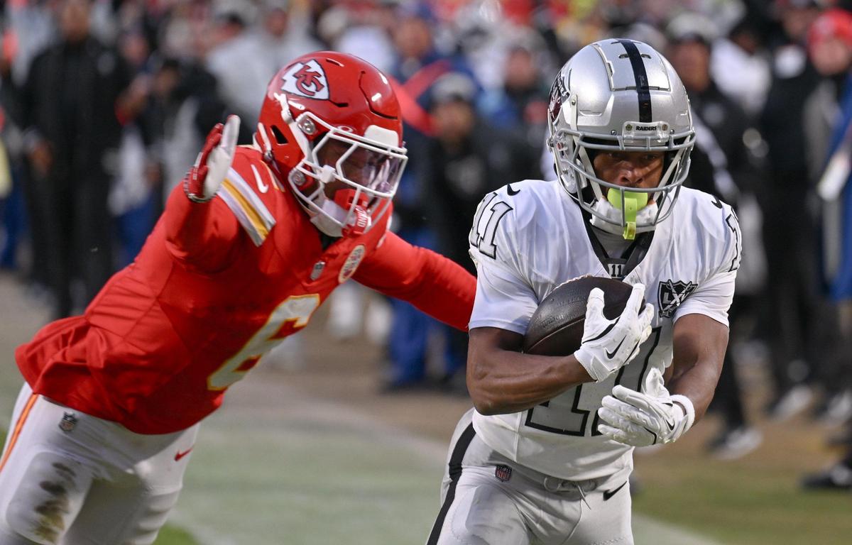 Las Vegas Raiders wide receiver Tre Tucker (11) beats Kansas City Chiefs safety Bryan Cook (6) to make a catch for touchdown in the second half on Friday, Nov. 29, 2024, at GEHA Field at Arrowhead Stadium.
