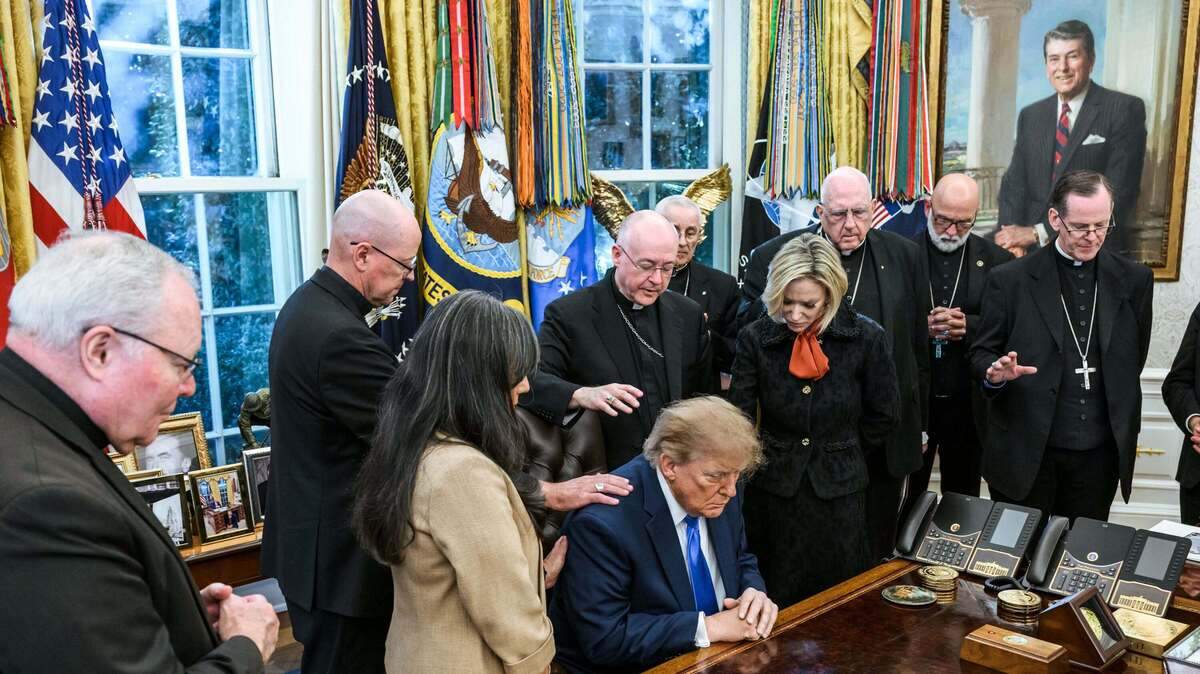 Ex-archbishop praying over Trump in viral photo wasn’t there for KC diocese, he says