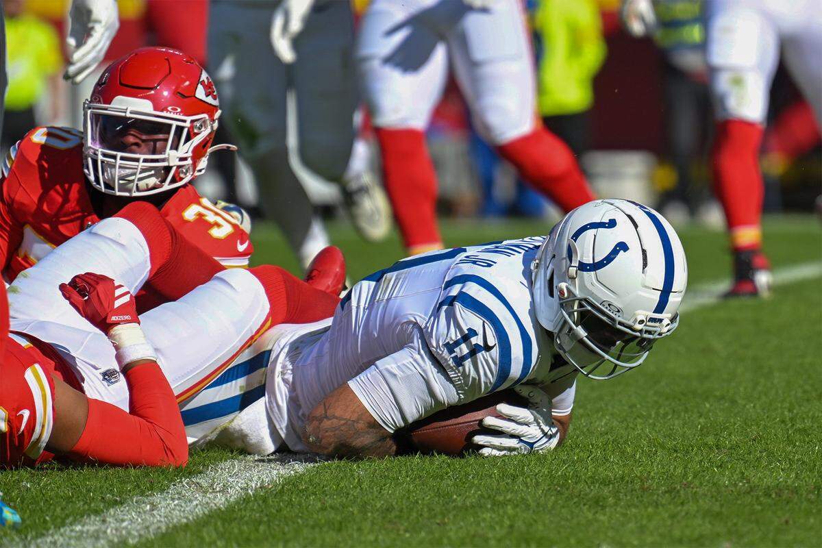 Indianapolis Colts wide receiver Michael Pittman (No. 11) scores a touchdown during an NFL Week 12 game against the Chiefs at GEHA Field at Arrowhead Stadium in Kansas City on Sunday, Nov. 23, 2025.