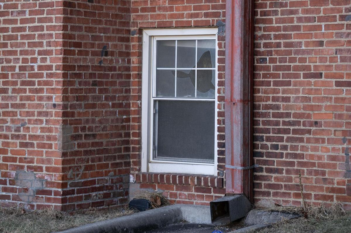 A broken window on the exterior of Mayfair Apartments in Kansas City on Tuesday, Jan. 28, 2025.