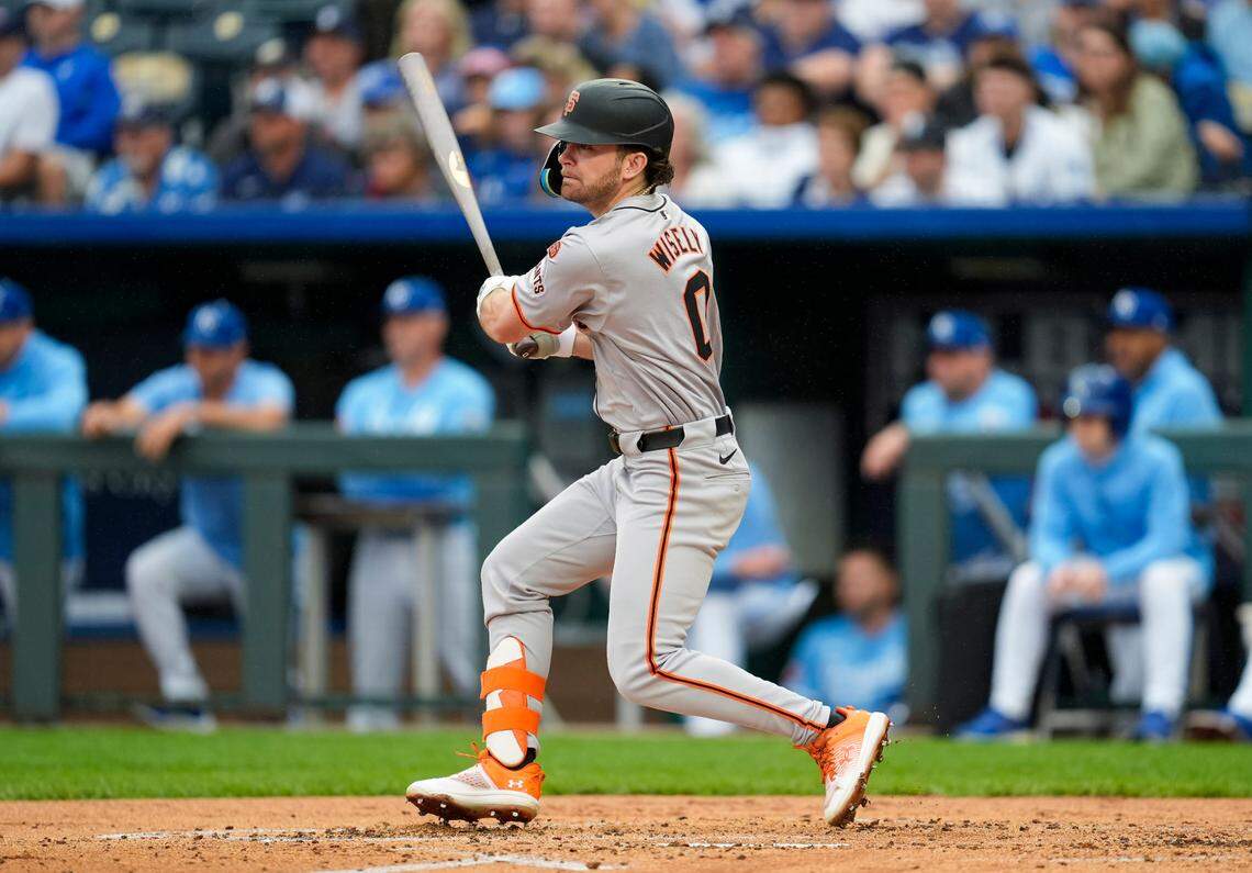 San Francisco Giants second baseman Brett Wisely hits an RBI single during the second inning of Sunday’s series finale against the Kansas City Royals at Kauffman Stadium.