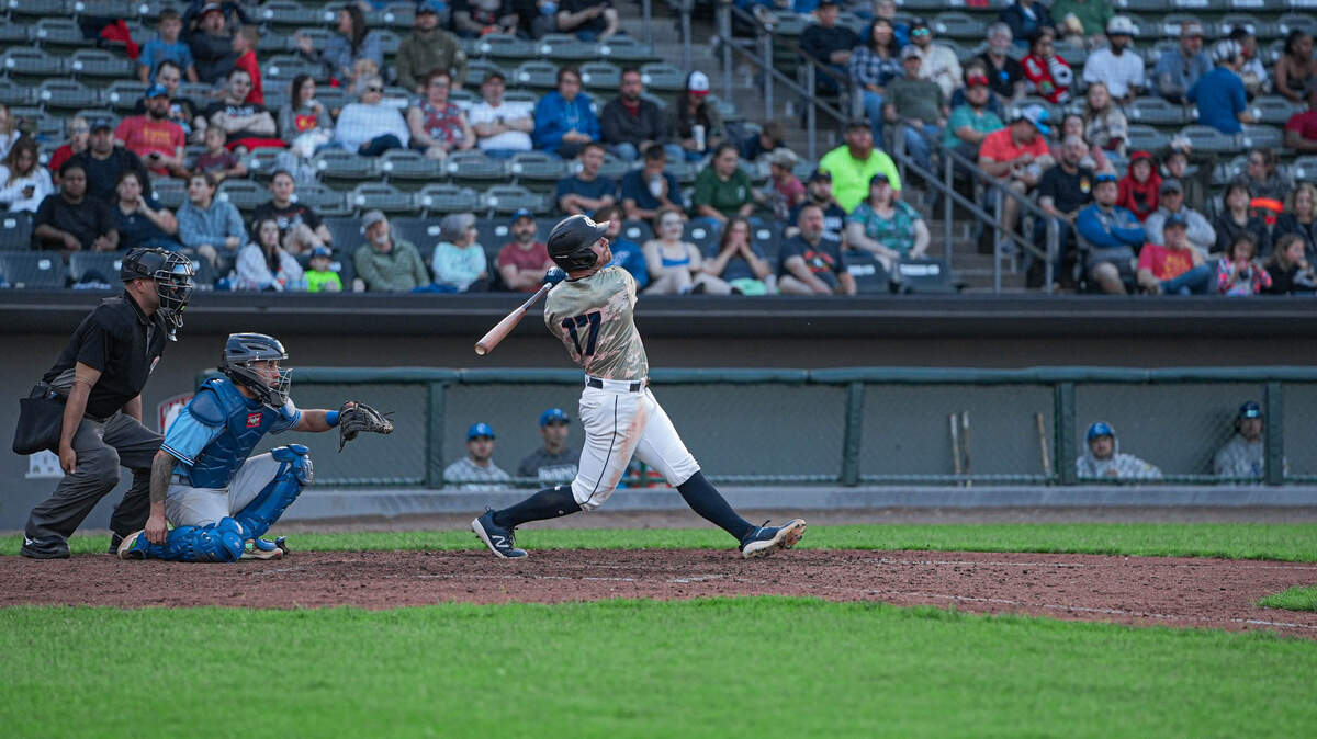 Kansas City Monarchs third baseman Gavin Collins swings during a game with the Sioux Falls Canaries at Legends Field on Saturday, May 20, 2023.