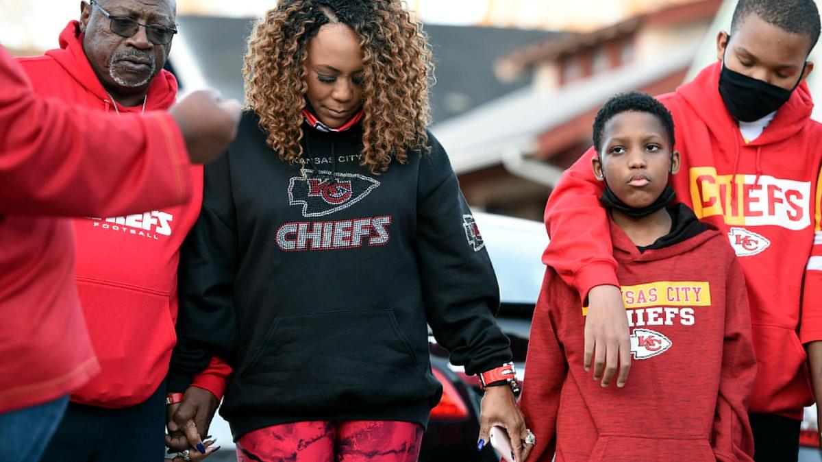 On the second anniversary of his death, the family of Cameron Lamb gathered Friday in front of the house where he was shot and killed on Kansas City’s east side. Lamb’s stepfather, Aqil Bey, left, and Lamb’s mother, Laurie Bey, joined hands in prayer after releasing balloons. Lamb was shot by Kansas City, Missouri, police officer, Eric DeValkenaere, who has been convicted of involuntary manslaughter.