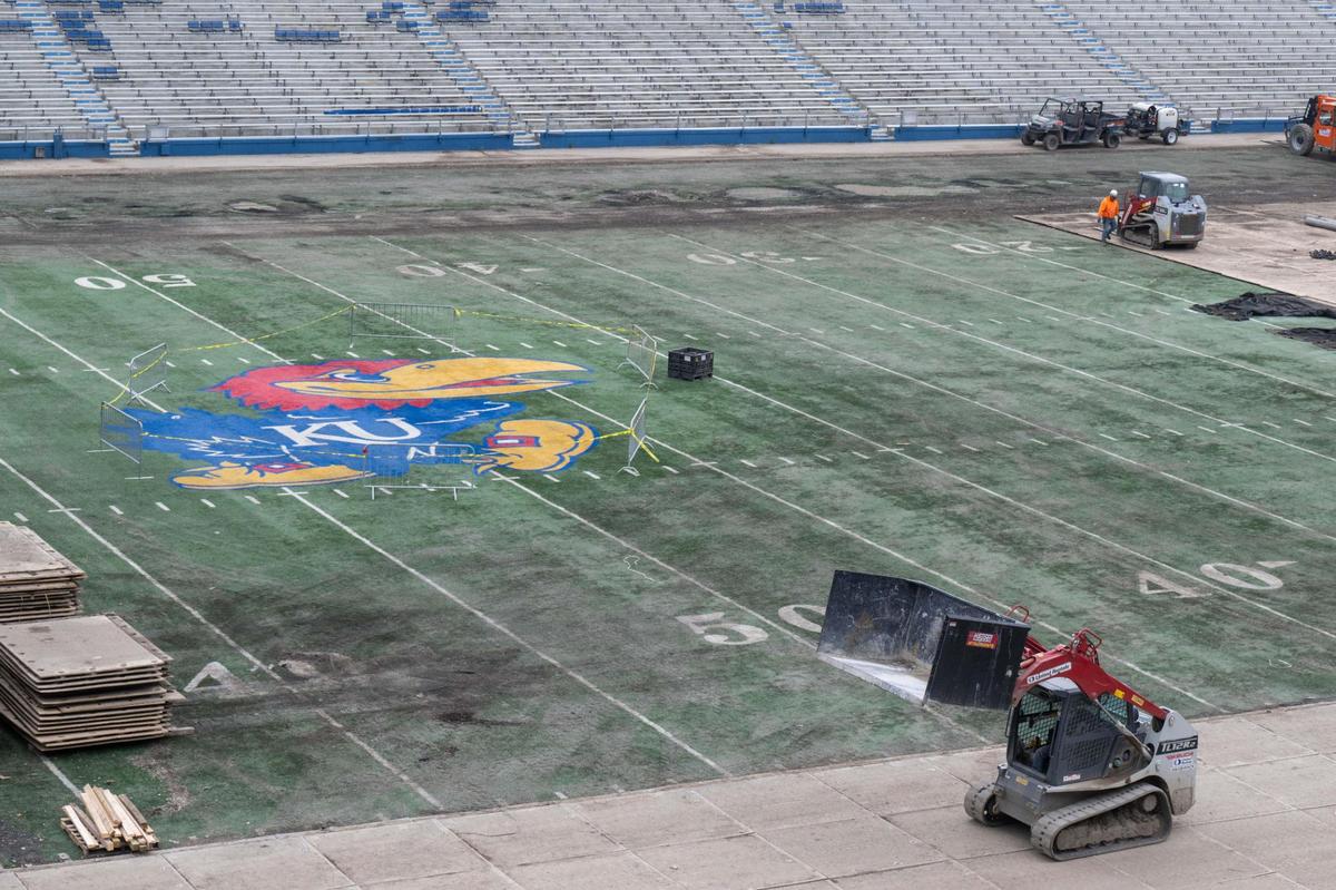 Barricades surround the Jayhawk logo at midfield at David Booth Kansas Memorial Stadium in Lawrence on Friday, April 25, 2025. Construction continues on the stadium and is slated to be near completion in the coming months.