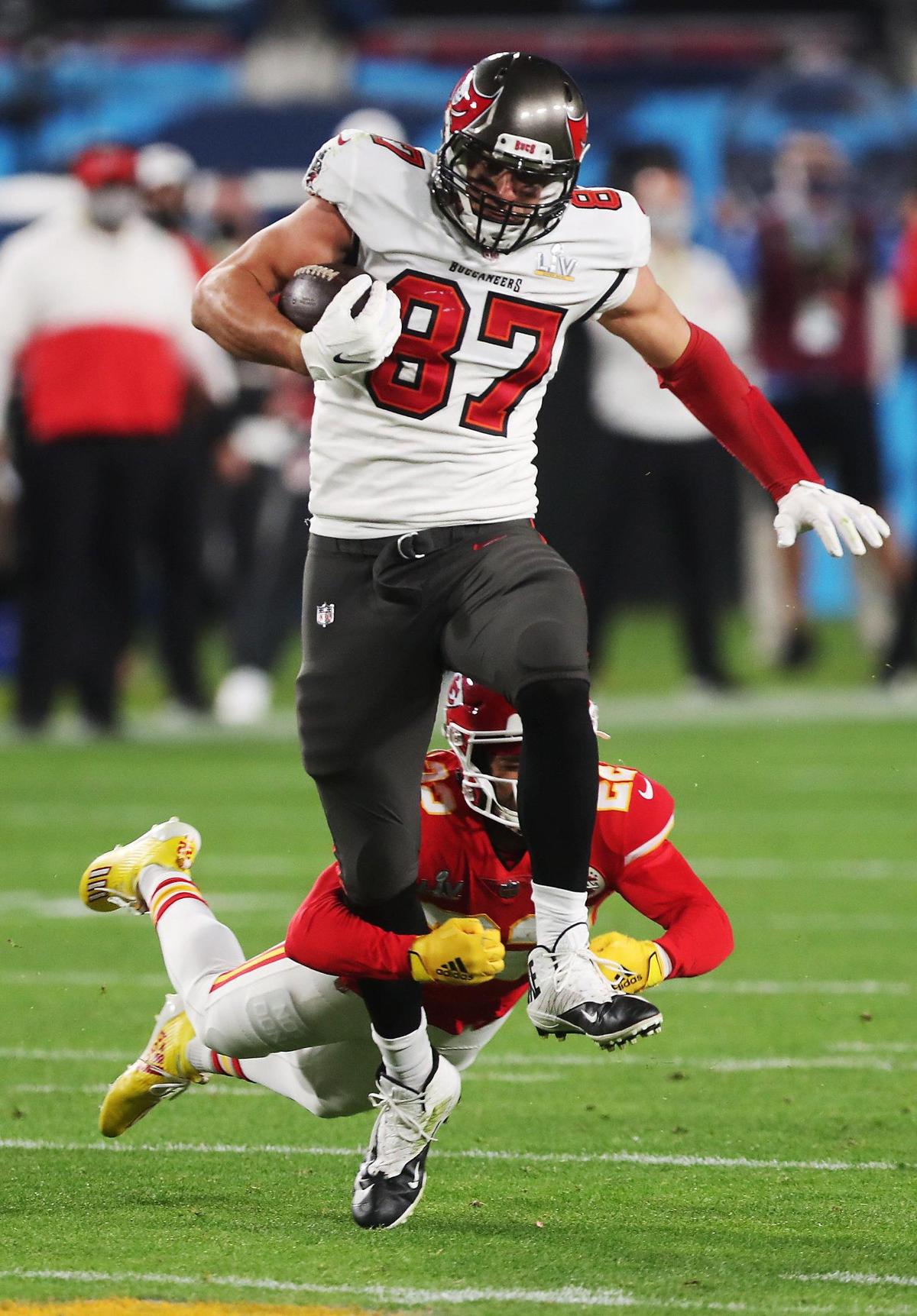 Kansas City Chiefs free safety Juan Thornhill attempts to bring down Tampa Bay Buccaneers tight end Rob Gronkowski in the third quarter Sunday, February 7, 2021, at Super Bowl LV at Raymond James Stadium in Tampa, Florida.