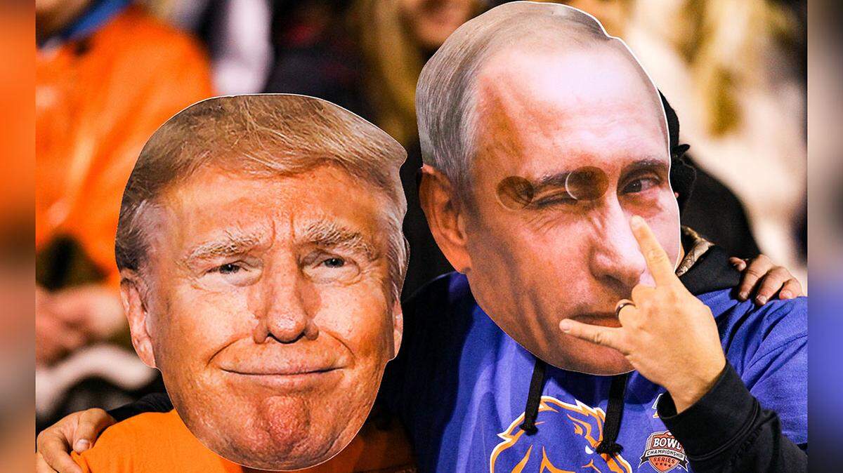 Oct 21, 2017; Boise, ID, USA; Boise State fans wearings masks with the likenesses of U.S. President Donald Trump and Russian President Vladimir Putin take in the action between the Boise State Broncos and the Wyoming Cowboys during the second half at Albertsons Stadium. Boise State defeated Wyoming 24-14. Mandatory Credit: Brian Losness-USA TODAY Sports