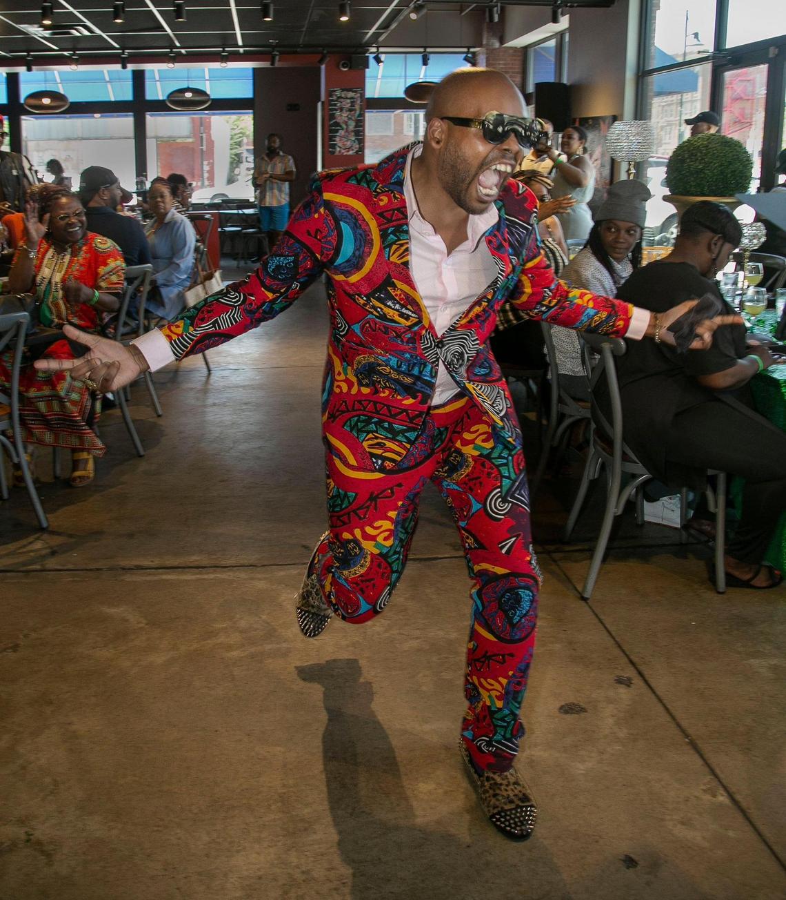 Marquez “Quez” Beasley, host of the live talk show “Quez Presents” made his entrance at the start of his mother’s day show and brunch Saturday, May 7, 2022, at Soiree Steak and Oyster House, 1512 E. 18th Street, Kansas City.