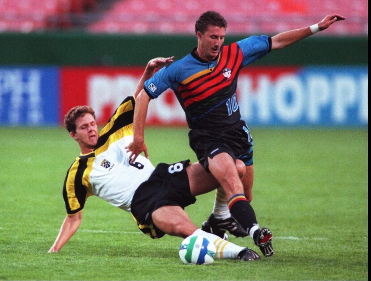 Columbus midfielder Todd Yeagley (left) tried to slow Wiz midfielder Mike Sorber during a 1996 MLS match, but Sorber had a goal and an assist in the 6-4 victory.