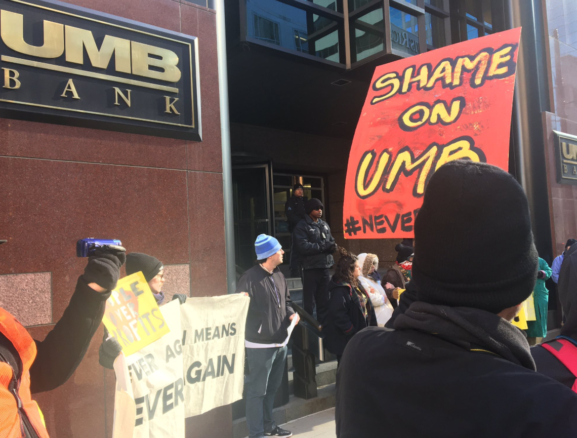 Protesters at UMB bank in downtown Kansas City demanded the bank cut ties with efforts to keep Immigration and Customs Enforcement prisoners at a jail in Rhode Island.