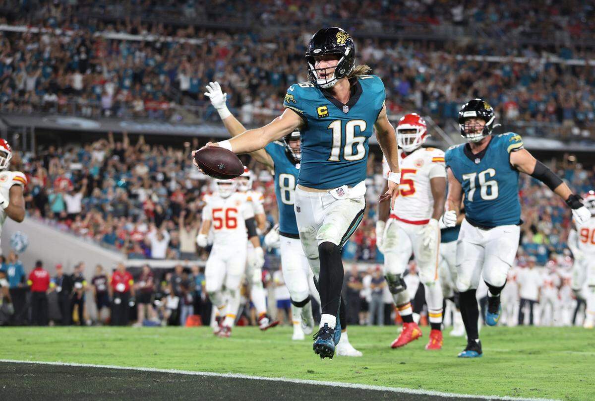 Jaguars quarterback Trevor Lawrence scores a touchdown against the Kansas City Chiefs during an NFL game at EverBank Stadium in Jacksonville, Florida on Monday, Oct. 6, 2025.
