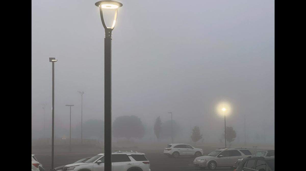 A blanket of dense fog covered the area surrounding the parking lot of Kansas City Ice Center in Shawnee on Tuesday morning. Drivers were being urged to use caution if they encountered the dense patchy fog on their morning trips.