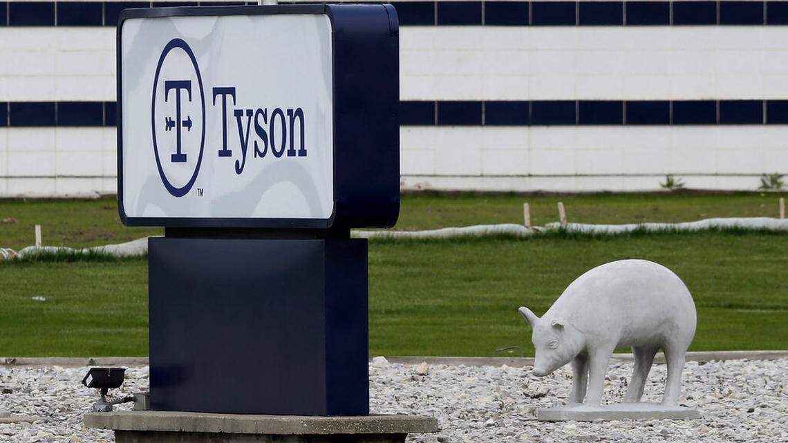 In this May 1, 2020, file photo, a sign sits in front of the Tyson Foods plant in Waterloo, Iowa. Civil rights attorney Tom Frerichs on Thursday June 25, 2020, filed a lawsuit on behalf of the estates of three Tyson Foods workers at its pork processing plant in Waterloo who died after contracting coronavirus. The lawsuit alleges the company knowingly put employees at risk during an outbreak and lied to keep them on the job.