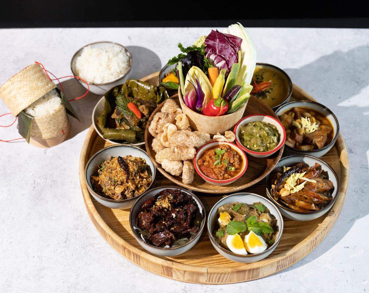 Waldo Thai offers the khan toke yai, a platter that lets customers try 10 Lanna dishes, with food and flavors executive chef Pam Liberda grew up with in Northern Thailand. They aren’t often featured at American Thai restaurants.