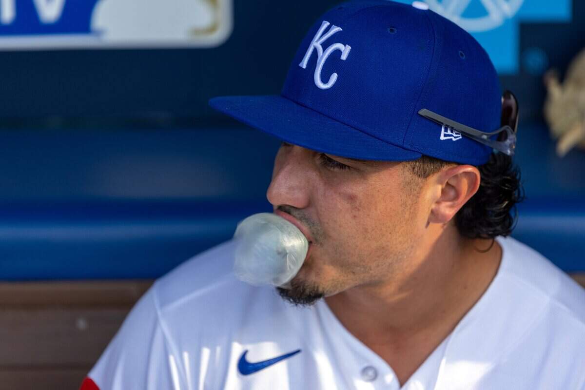Infielder Josh Rojas, #40, blows a bubble during Thursday's Armed Forces Night game at Kauffman Stadium on July 2, 2026. The Tampa Bay Rays came out on top over the Royals with a final score of 5 to 2.