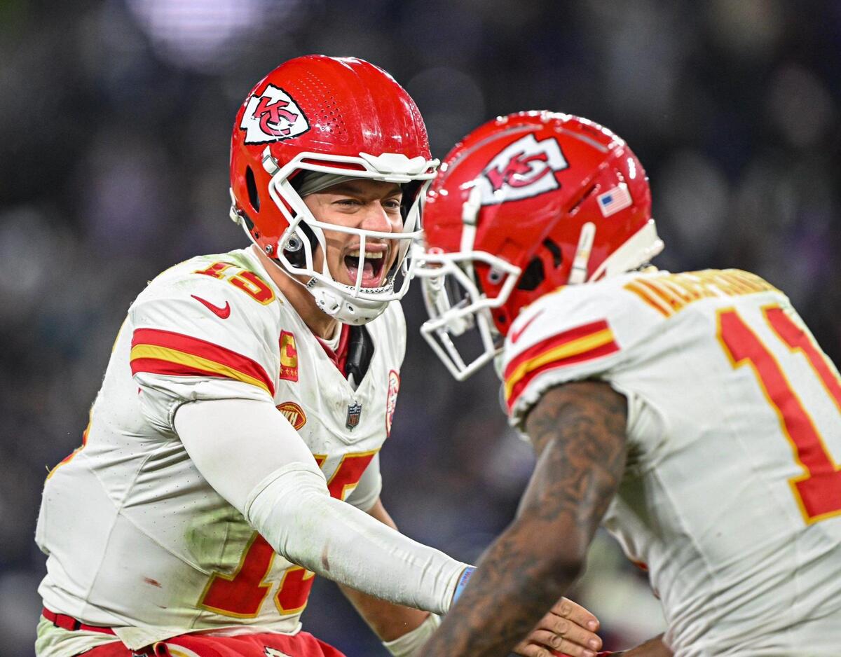 Kansas City Chiefs quarterback Patrick Mahomes (15) celebrates with wide receiver Marquez Valdes-Scantling (11) after Valdes-Scantling hauled in a long pass late in the fourth quarter against the Baltimore Ravens Sunday, Jan. 28, 2024, during the AFC Championship Game in Baltimore.