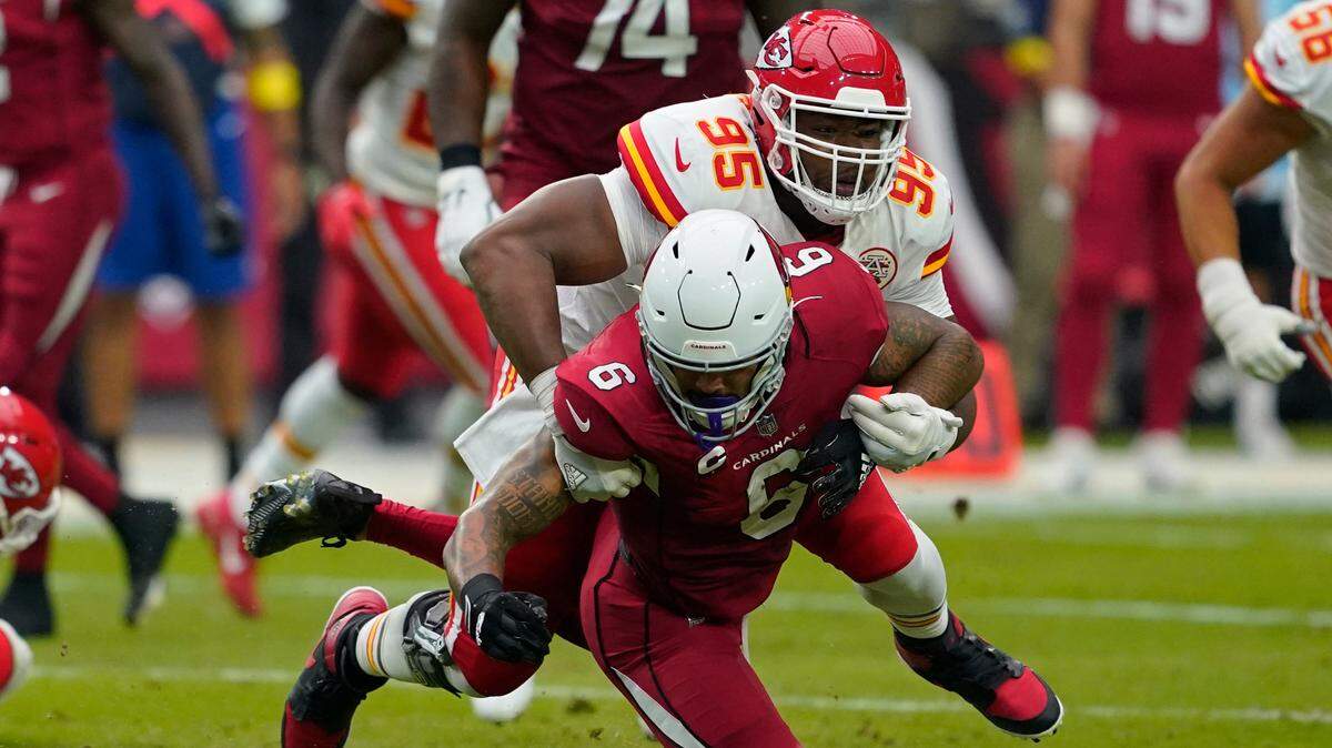 Kansas City Chiefs defensive tackle Chris Jones (95) forces Arizona Cardinals running back James Conner (6) to fumble during the first half of an NFL football game, Sunday, Sept. 11, 2022, in Glendale, Ariz. Conner recovered the fumble.