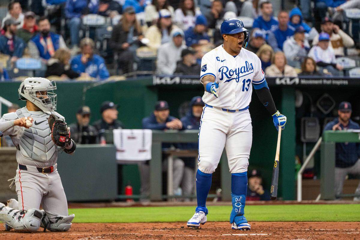Kansas City Royals catcher Salvador Perez gestures toward the Boston Red Sox pitcher during a game on Tuesday, May 19, 2026, at Kauffman Stadium.