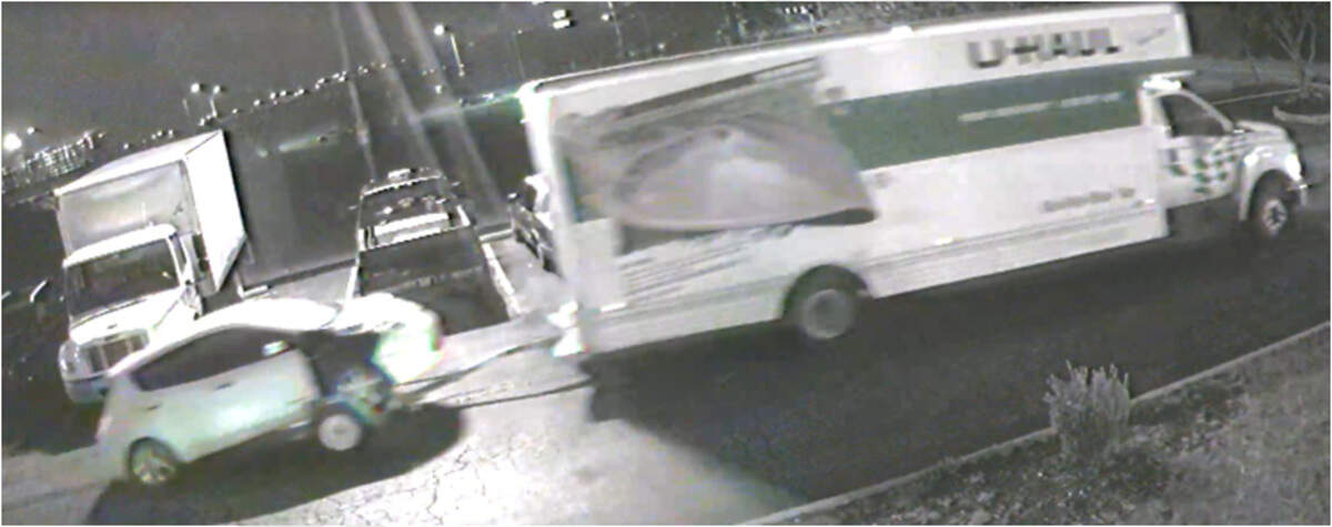 Surveillance video shows the U-Haul and car that were stolen from a hotel parking lot last week.