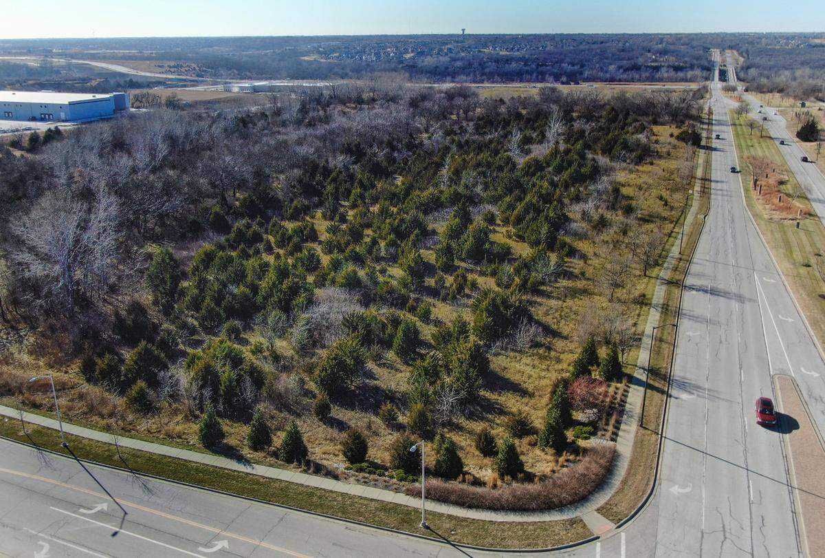 Construction on the new Lenexa Justice Center, which will be built at the southwest corner of Prairie Star Parkway and Britton Street (seen here heavily wooded) is slated to begin in the fall of 2022.
