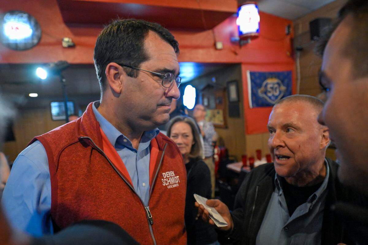 Kansas Attorney General Derek Schmidt, the Republican nominee for Governor, spoke to supporters after he and Virginia Governor Glenn Youngkin campaigned together Thursday, Sept. 22, 2022, at Hayward’s Pit Bar B Que in Shawnee. The event was hosted by the Kansas Republican Party.