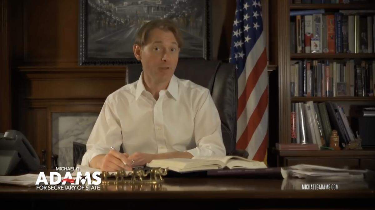 A screenshot from a campaign advertisement for Michael G. Adams.