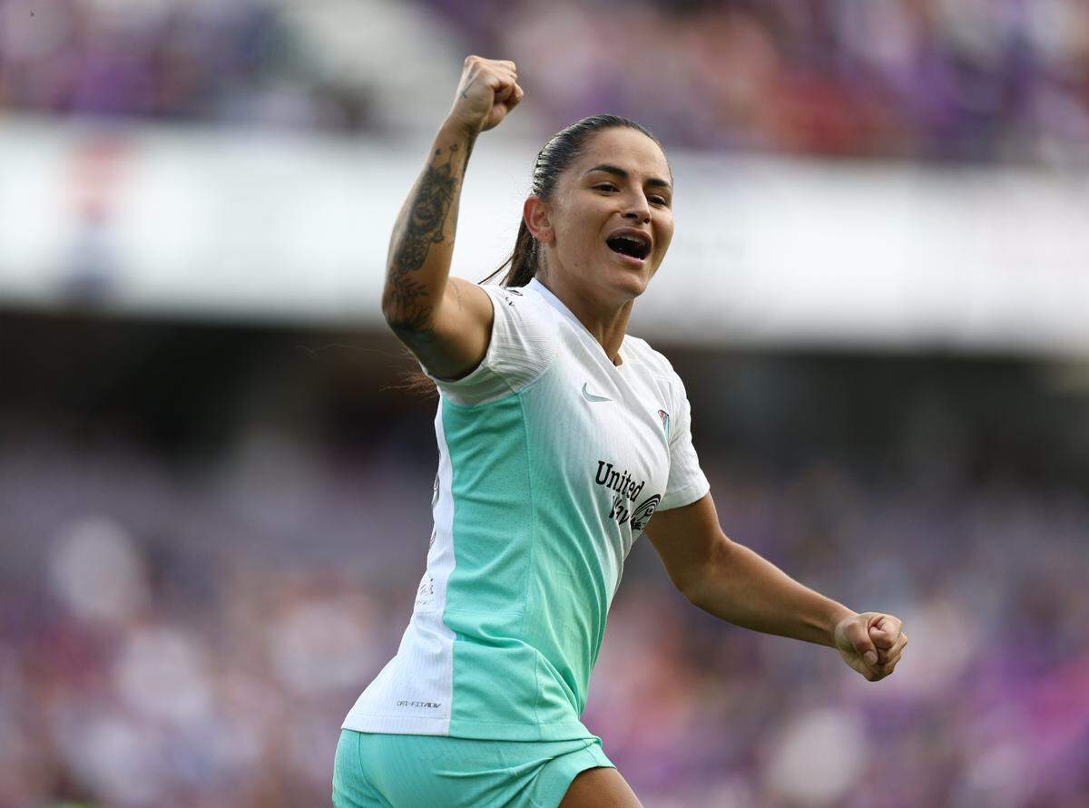 Kansas City Current midfielder Debinha celebrates her first-half goal against the Orlando Pride during an NWSL playoff semifinal soccer match at Inter&Co Stadium in Orlando on Sunday, Nov. 17, 2024.