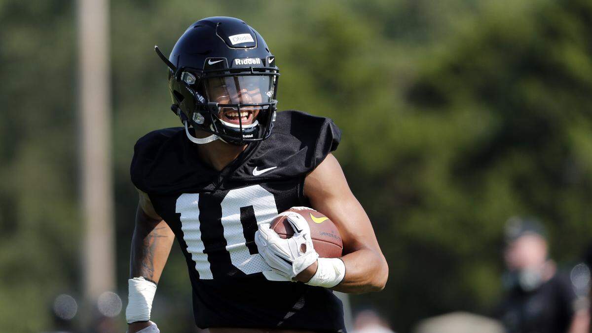 Missouri wide receiver Alex Ofodile ran with the ball during an NCAA college football practice Friday, Aug. 3, 2018, in Columbia, Mo.