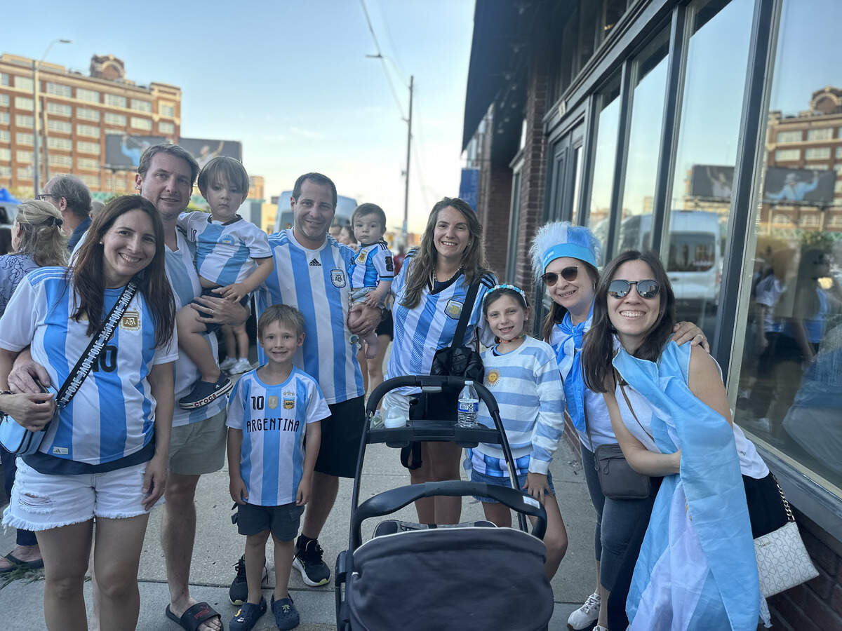 Matias Montes (5th from left) and his family. Matias Montes traveled from Barcelona, Spain, to Iowa City to meet with his brother. Then, Montes and his family made their way to Kansas City.
