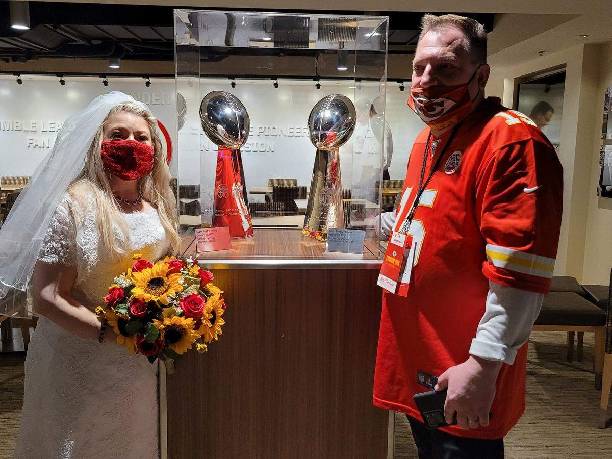 Something old, something new, something borrowed, something … super. Angelique (Angel) Jones Reeves and Michael Reeves posed with the Chiefs’ two Super Bowl trophies last year. During a tour of Arrowhead the two sneakily exchanged vows.