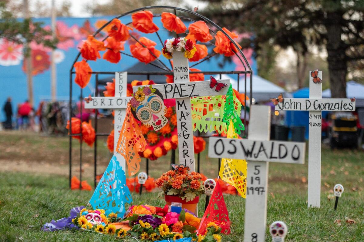 Calaveras, paper mache, and marigold flowers are adorned on ofrendas during the Dia de los Muertos festival at the Mattie Rhodes Center.