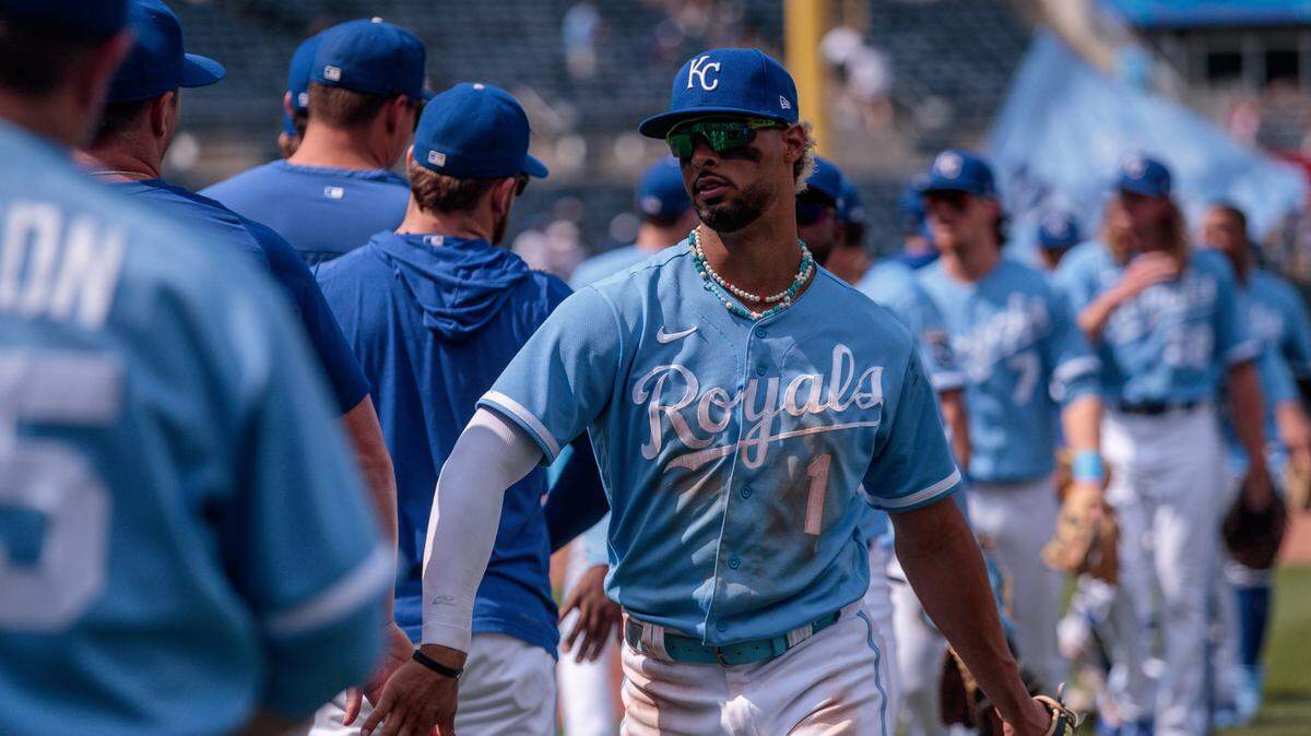 Kansas City Royals right fielder MJ Melendez (1) slaps hands with the team after the game against the Colorado Rockies at Kauffman Stadium on June 4, 2023.