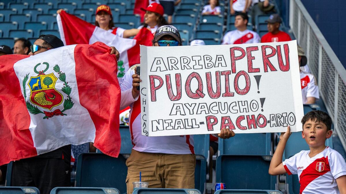 Peru fans hold up signs before a a Group A Copa America match between Canada and Peru at Children’s Mercy Park Tuesday, June 25, 2024, in Kansas City, Kansas.