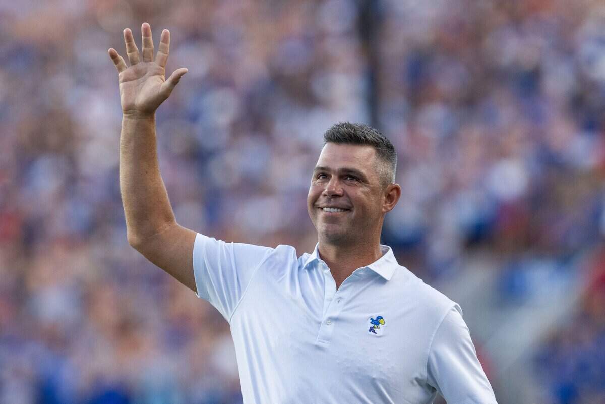 PGA Tour golfer and former Jayhawk Gary Woodland waves to the crowd in the first half of the Jayhawks game vs. Long Island University Sharks at David Booth Memorial Stadium on Friday, September 4, 2026, in Lawrence.