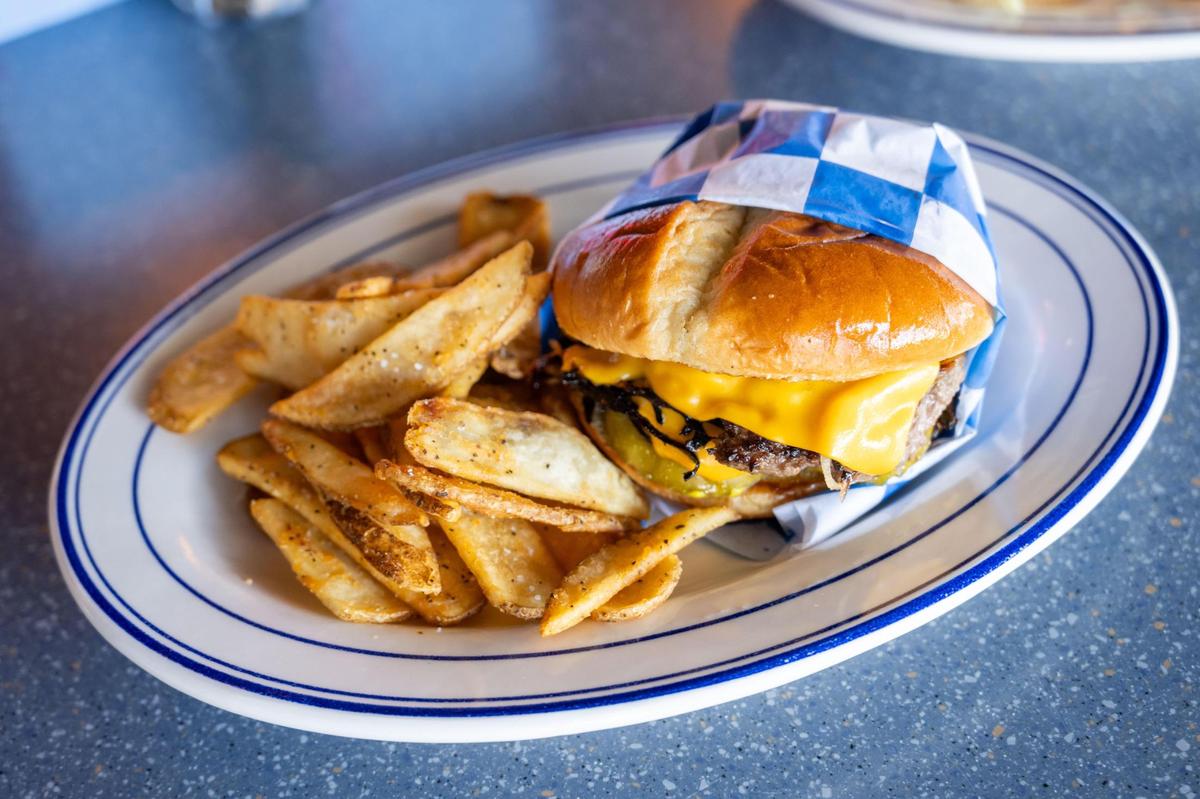 Hank’s Original is a double smash burger with fries and special sauce.