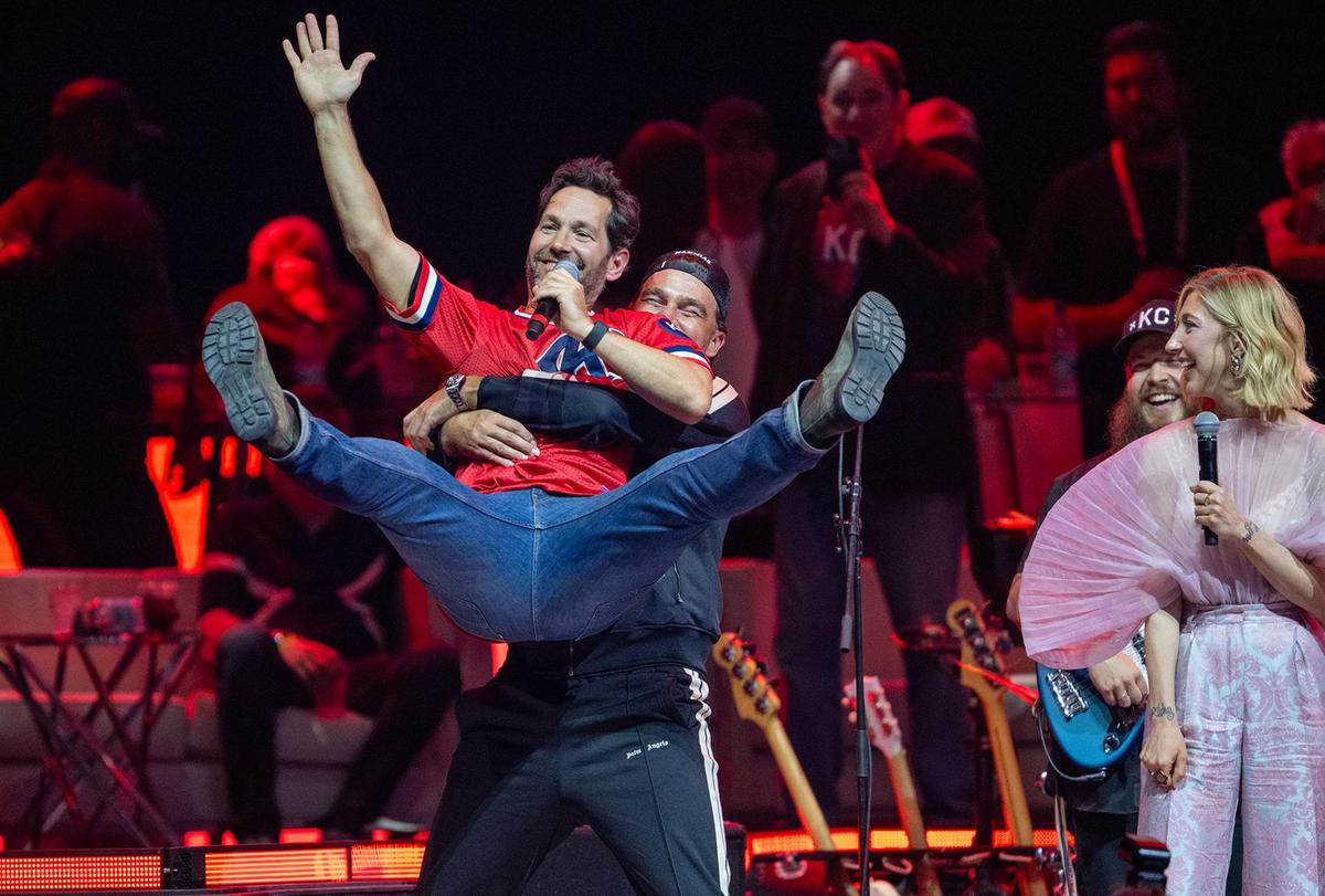 Chiefs tight end Travis Kelce lifts up Paul Rudd on stage at the Big Slick Show on Saturday, May 31, 2025, at the T-Mobile Center in Kansas City.